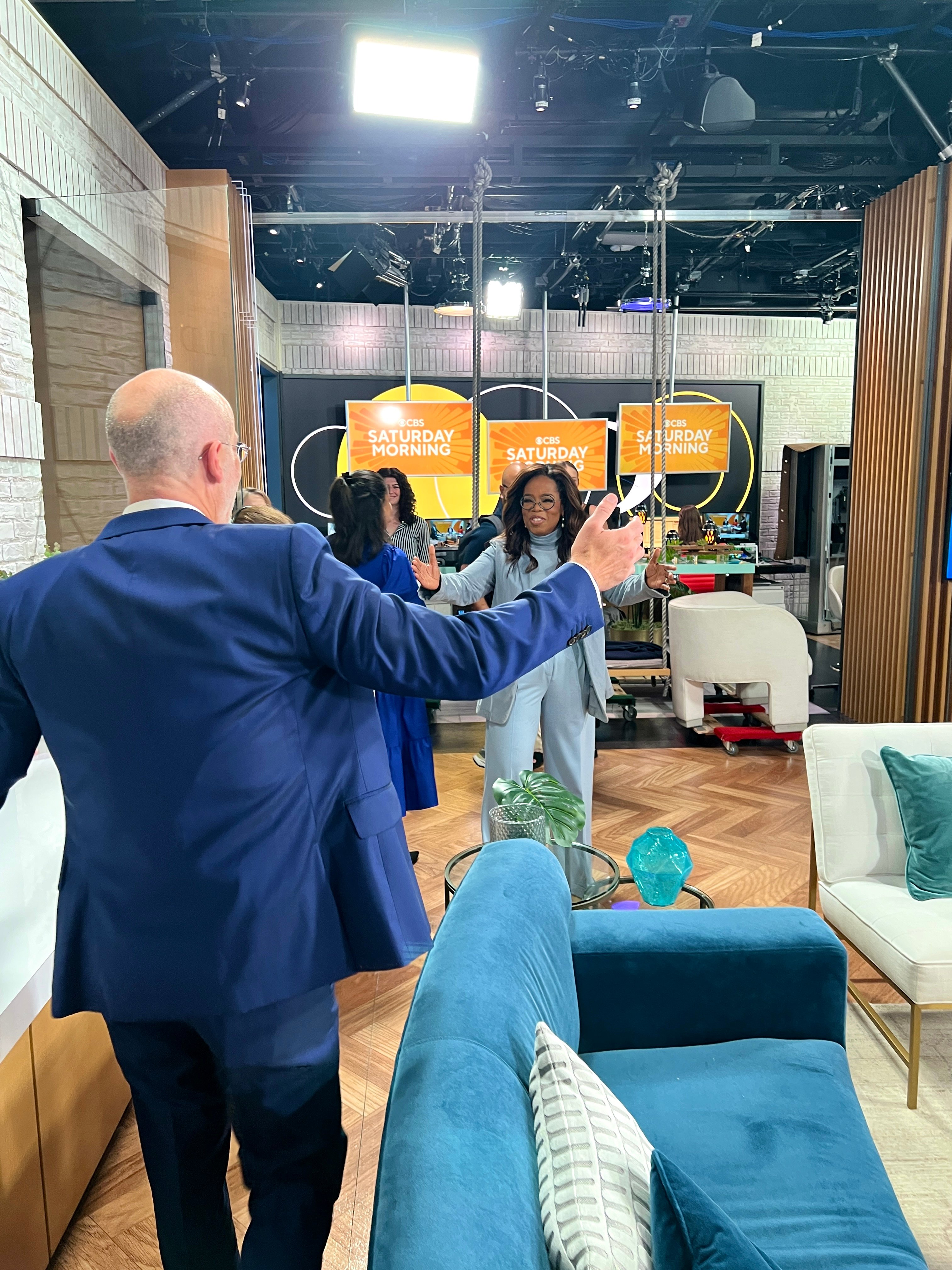 Oprah and Arthur Brooks greet at CBS Morning